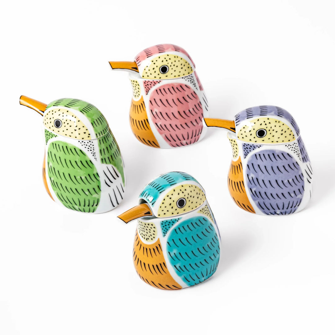 Bird-shaped soy sauce dispenser with colorful hand-painted details, adding a playful accent to your table.