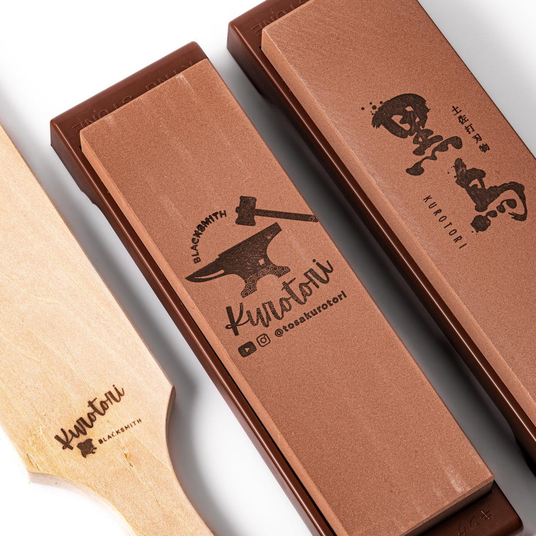 Japanese knife maintenance kit with whetstones leather strop and polishing compound for sharpening blades.