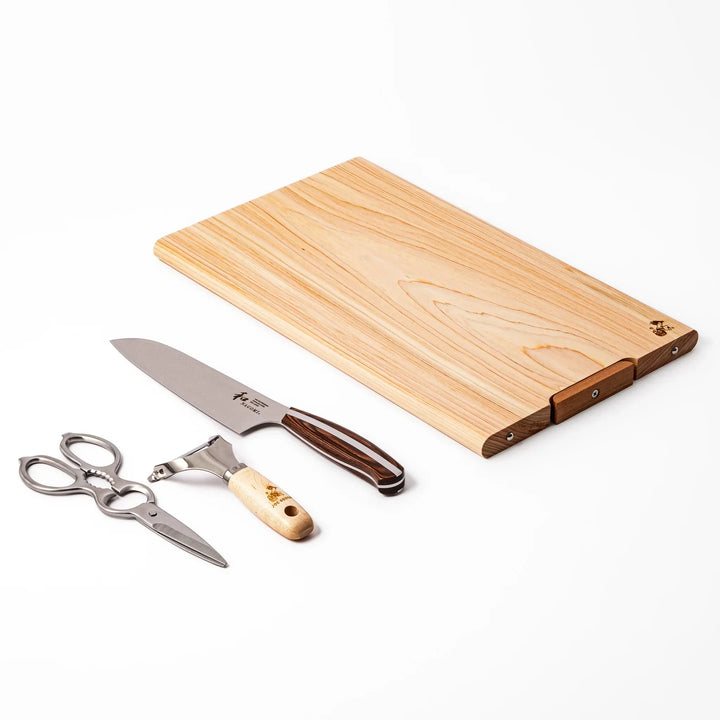 Knife and Prep Basics Set with Japanese chefs knife shears peeler and wooden board for daily cooking.