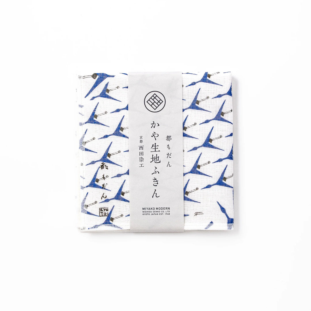Kyoto Yuzen dyed Kaya cotton kitchen cloth featuring a repeating blue Japanese crane pattern on white fabric with a modern touch