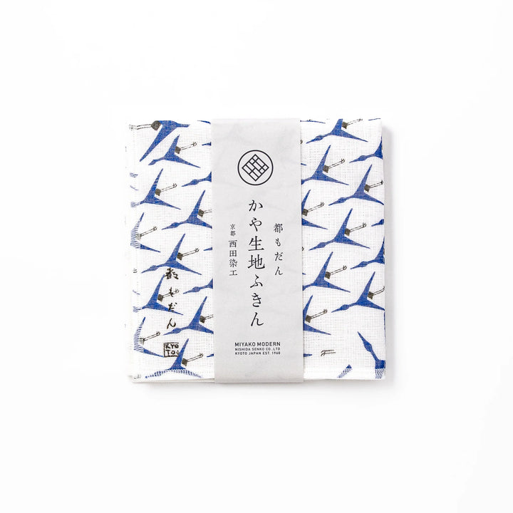 Kyoto Yuzen dyed Kaya cotton kitchen cloth featuring a repeating blue Japanese crane pattern on white fabric with a modern touch