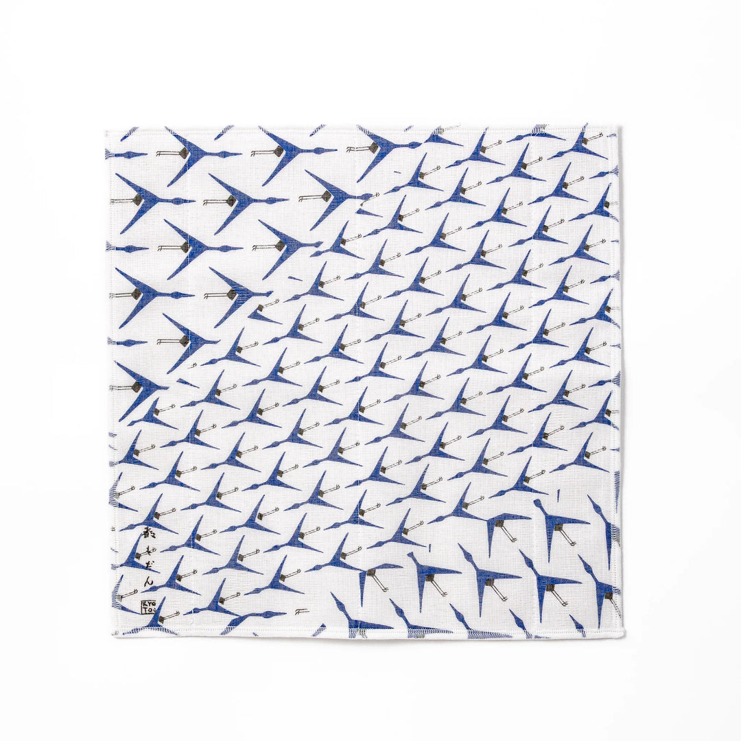 Kyoto Yuzen dyed Kaya cotton kitchen cloth featuring a repeating blue Japanese crane pattern on white fabric with a modern touch