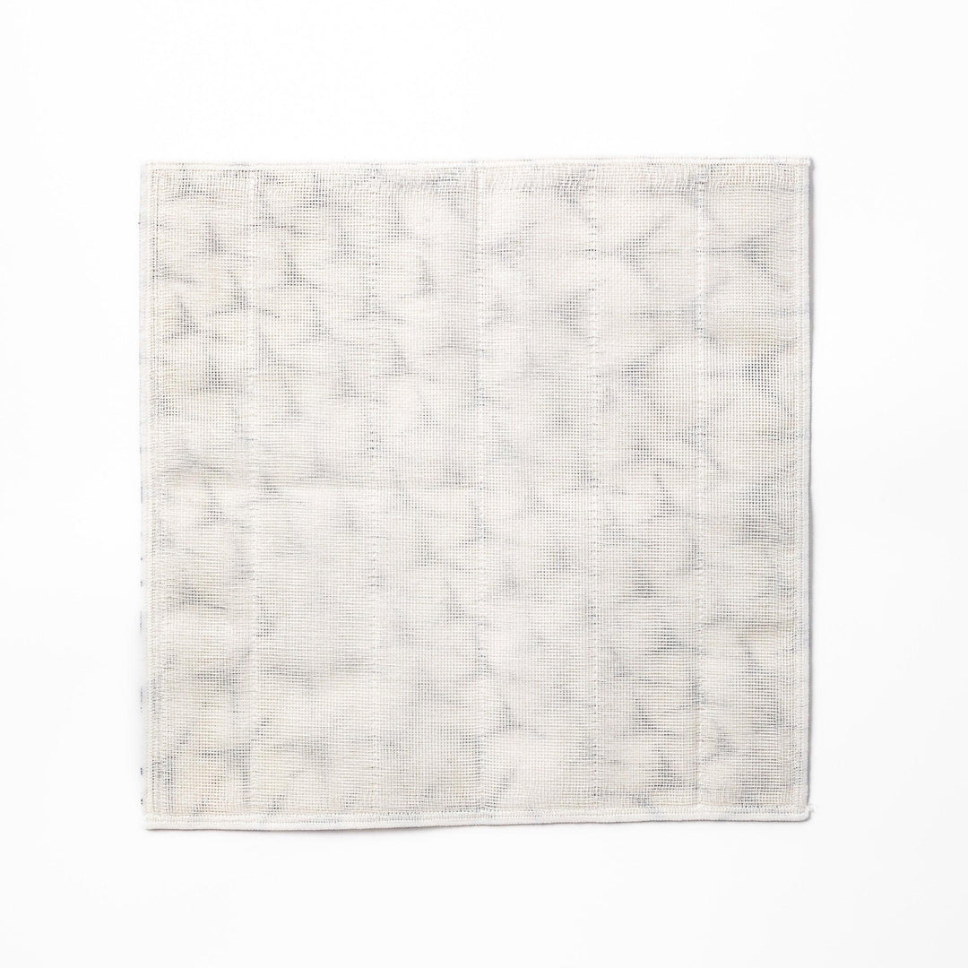 Kyoto Yuzen dyed Kaya cotton kitchen cloth featuring a repeating blue Japanese crane pattern on white fabric with a modern touch
