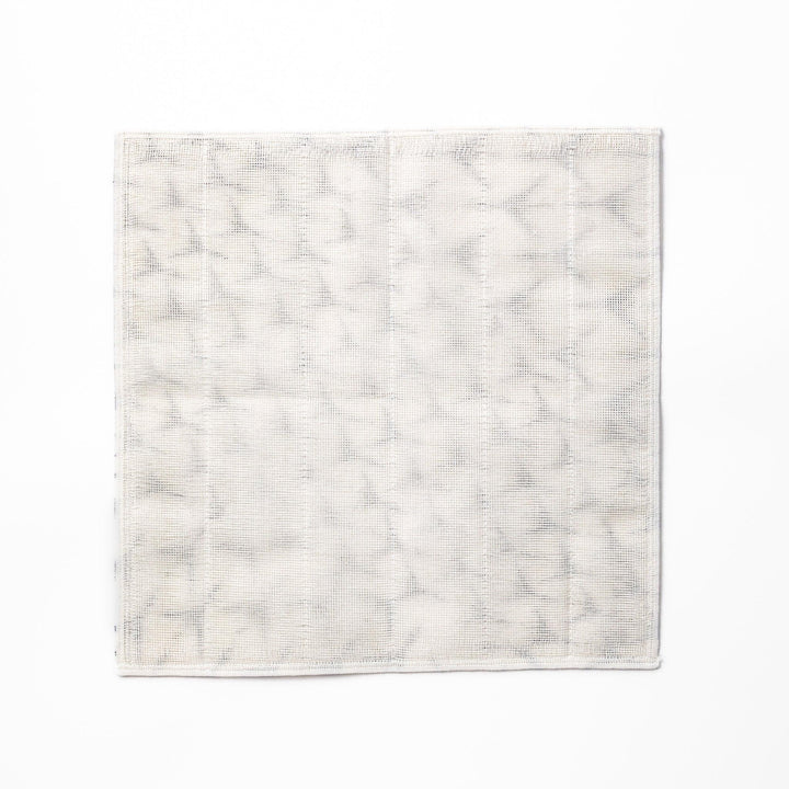 Kyoto Yuzen dyed Kaya cotton kitchen cloth featuring a repeating blue Japanese crane pattern on white fabric with a modern touch