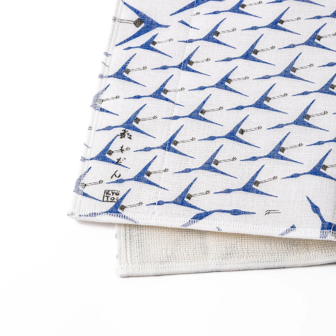 Kyoto Yuzen dyed Kaya cotton kitchen cloth featuring a repeating blue Japanese crane pattern on white fabric with a modern touch