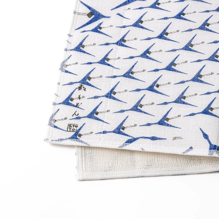 Kyoto Yuzen dyed Kaya cotton kitchen cloth featuring a repeating blue Japanese crane pattern on white fabric with a modern touch