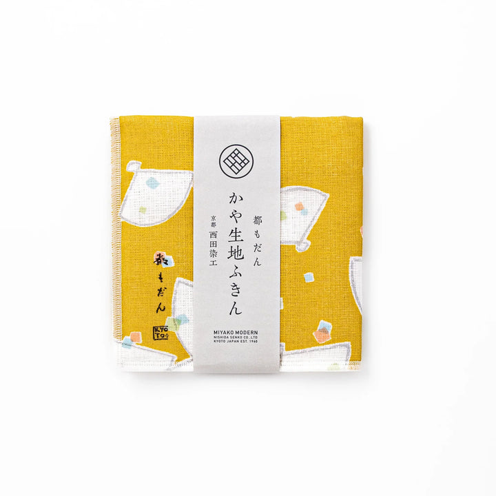 Kyoto Yuzen dyed Kaya cotton kitchen cloth featuring a mustard yellow background with colorful Japanese folding fan patterns