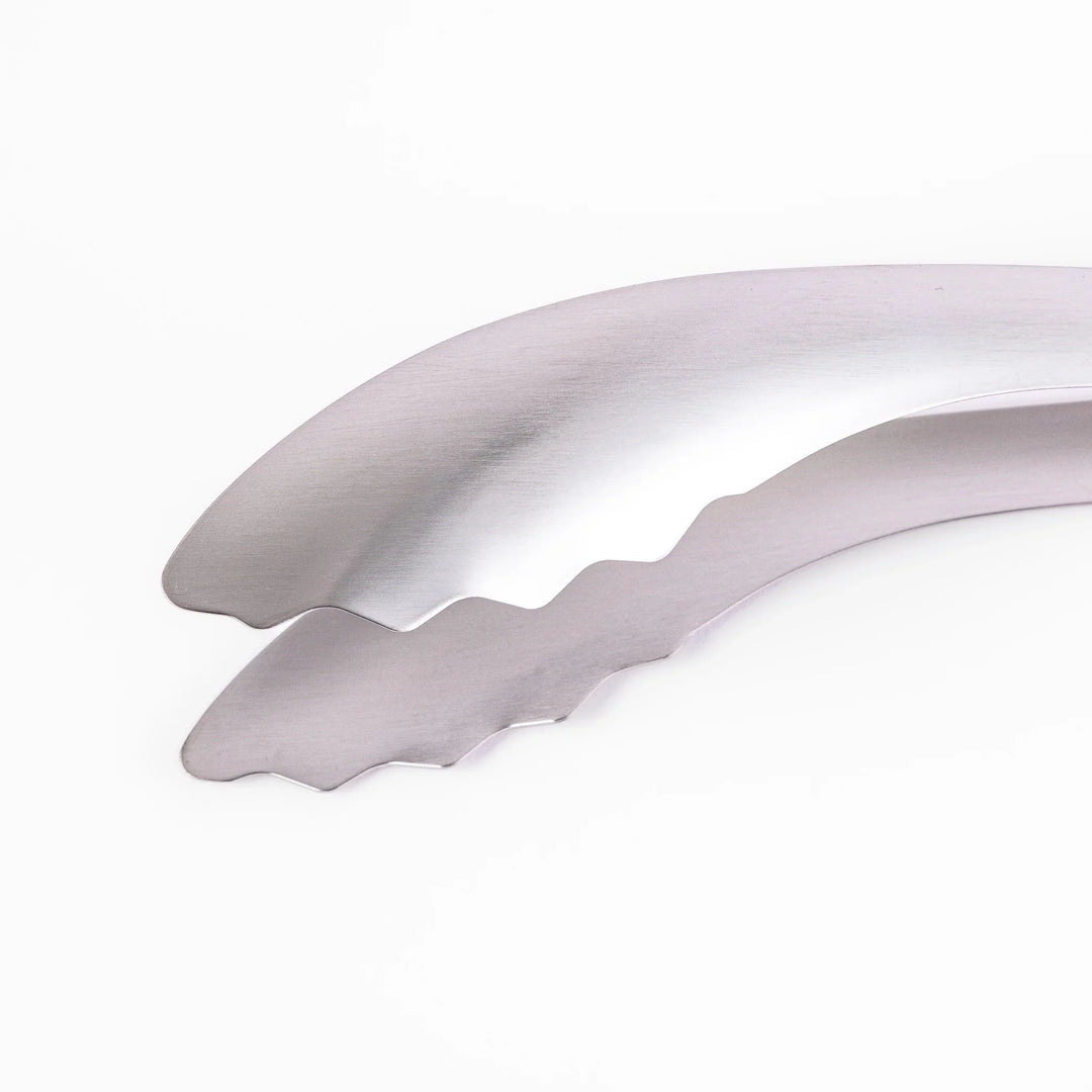 Japanese stainless steel kitchen tongs with slim curved tips for precise serving and plating