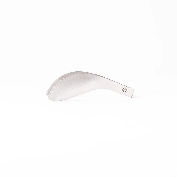 Japanese stainless steel precision fingertip tongs with slim curved tips and brushed finish for delicate plating