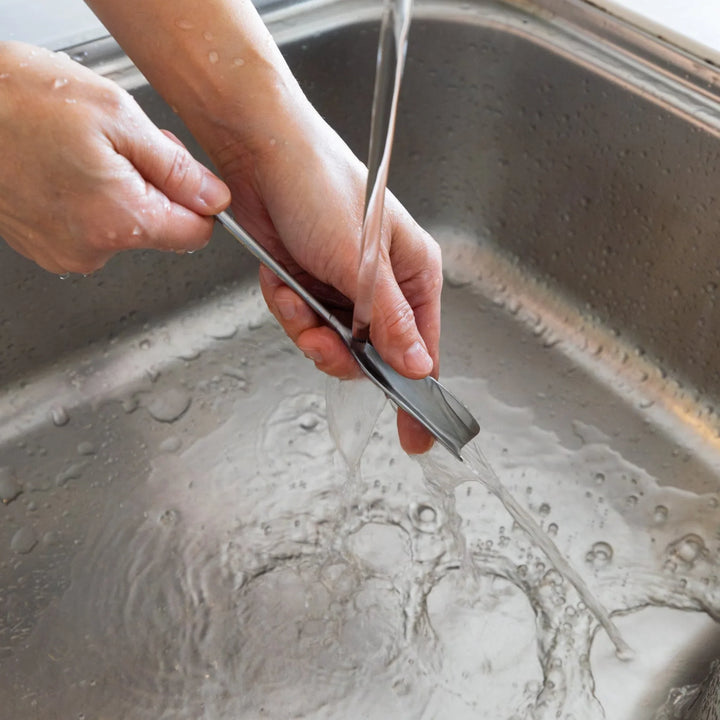 Nami washing stainless steel aux japanese honey spoon under running tap water inside kitchen sink easy clean flatware