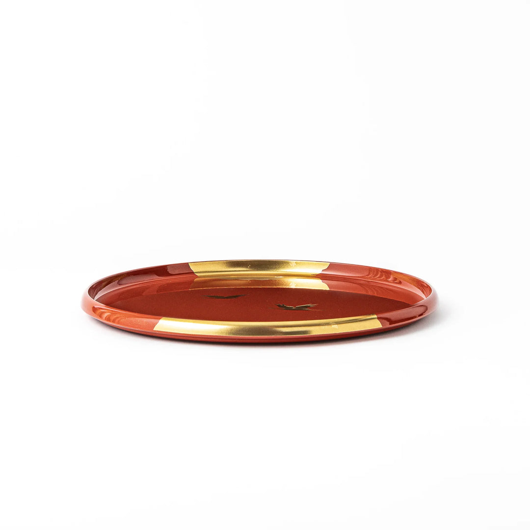 Japanese lacquer serving tray with flying crane motif in gold on red finish elegant round design for traditional table setting