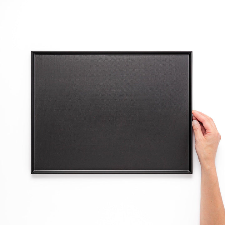 Modern Japanese black lacquer serving tray with horizontal grain texture and side grooves for easy use.