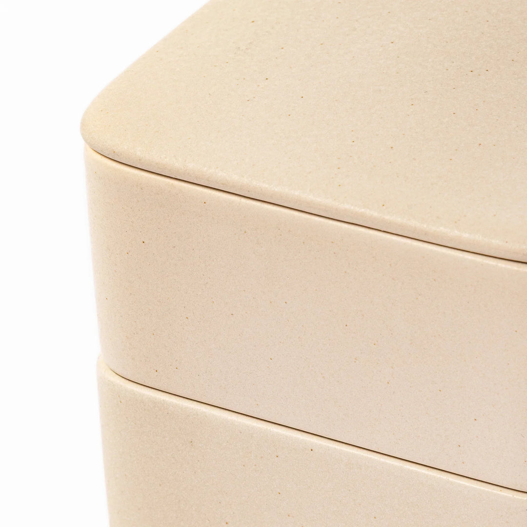 Minimalist white Japanese porcelain bento box set, two-tiered design for elegant meal presentation and versatile storage.