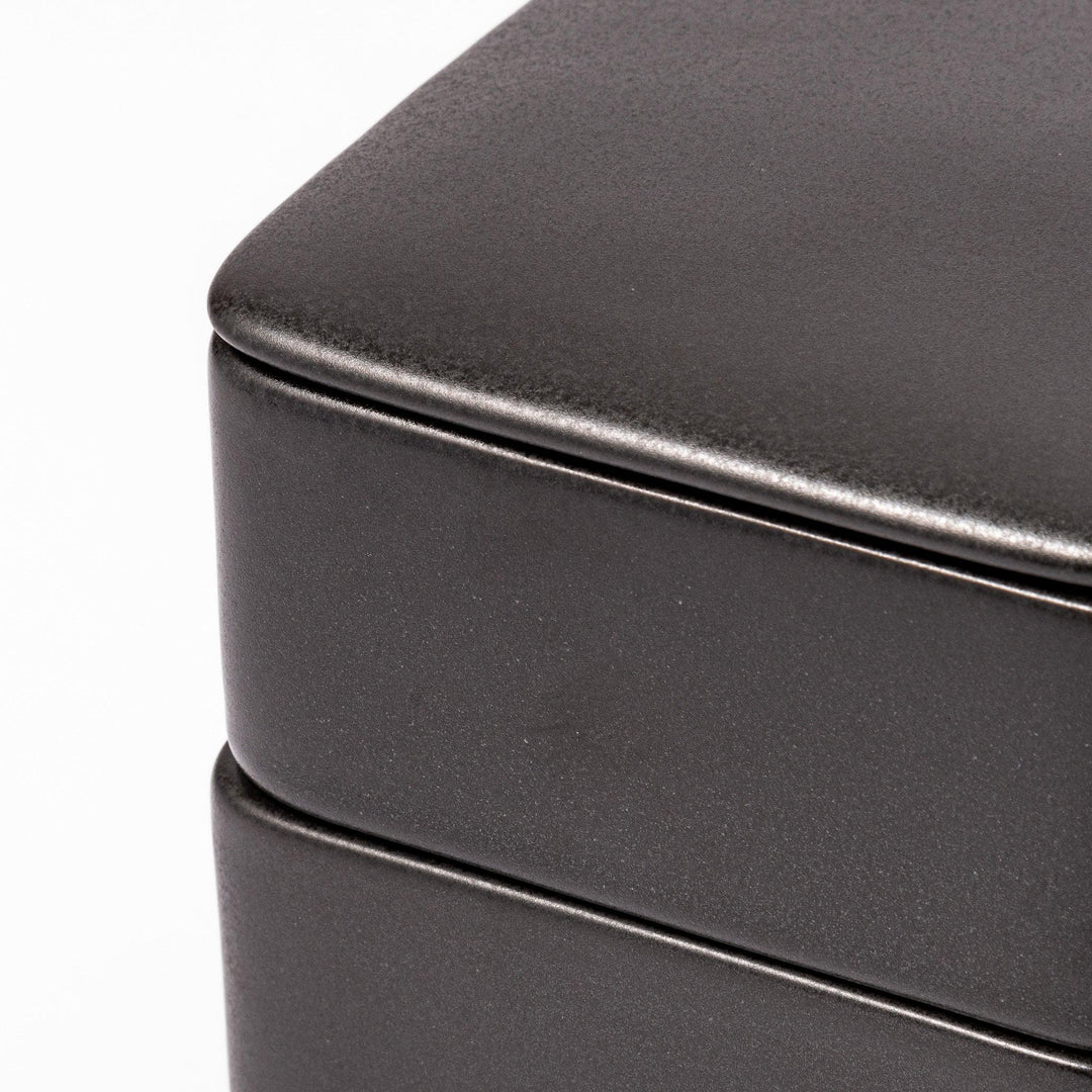 Sleek black Japanese porcelain two tier bento box set with minimalist design for modern meal presentation.