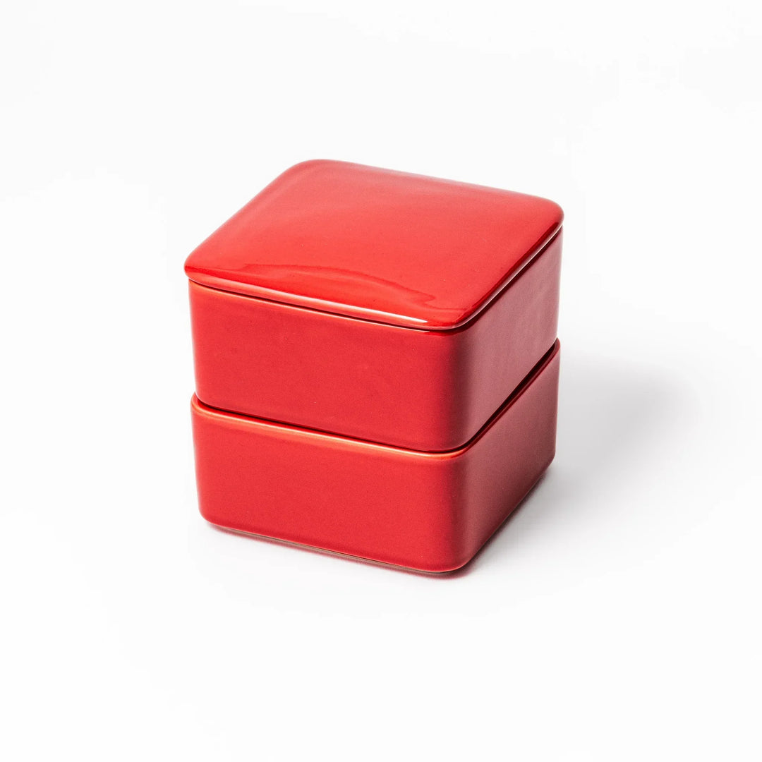 Vibrant red Japanese porcelain two tier bento box set with square design for stylish modern meal serving.