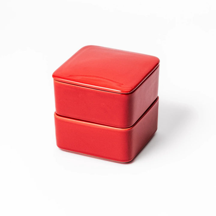 Vibrant red Japanese porcelain two tier bento box set with square design for stylish modern meal serving.