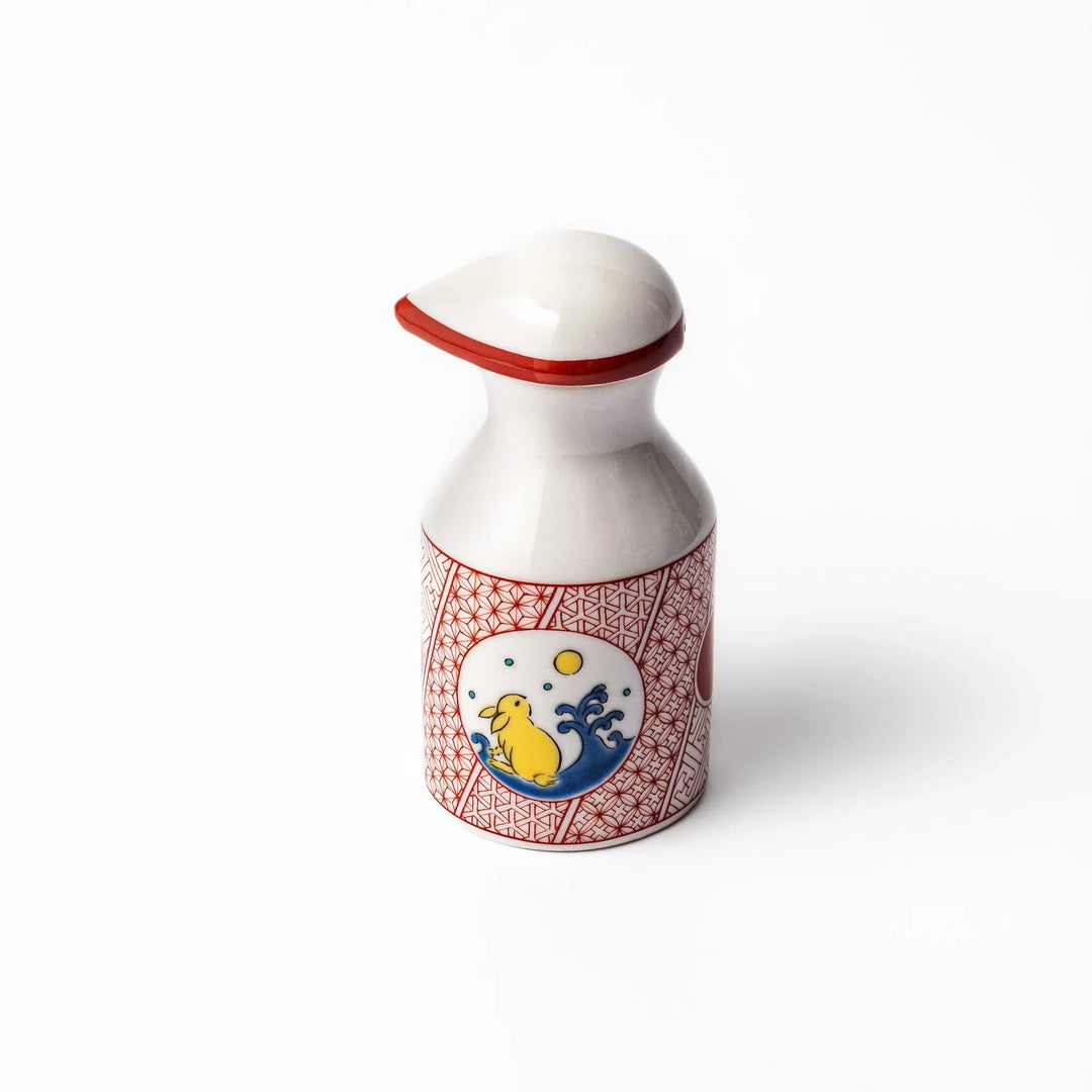 Japanese ceramic soy sauce dispenser with red geometric pattern and moon rabbit motif for elegant dining.