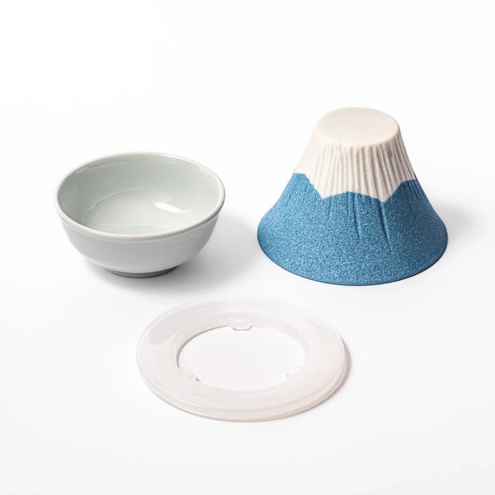 Sky blue Mount Fuji ceramic coffee filter with snowy peak handcrafted in Japan for reusable pour over brewing.