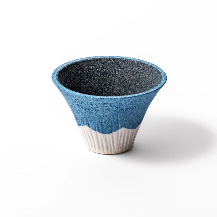 Sky blue Mount Fuji ceramic coffee filter with snowy peak handcrafted in Japan for reusable pour over brewing.