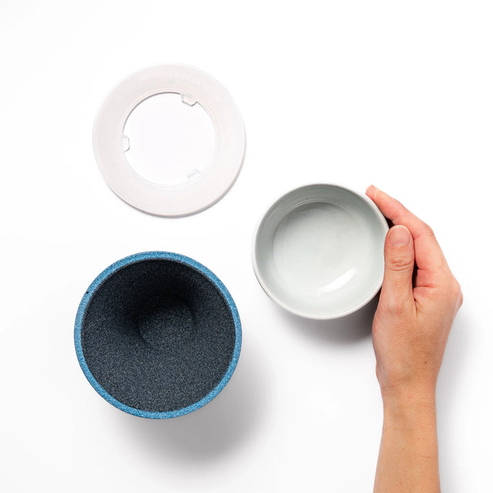 Sky blue Mount Fuji ceramic coffee filter with snowy peak handcrafted in Japan for reusable pour over brewing.
