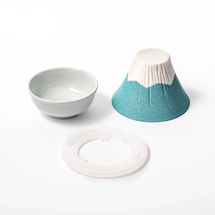 Turquoise Mount Fuji ceramic coffee filter with snowy peak handcrafted in Japan for unique pour over brewing.