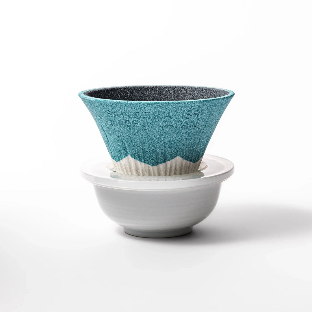 Turquoise Mount Fuji ceramic coffee filter with snowy peak handcrafted in Japan for unique pour over brewing.