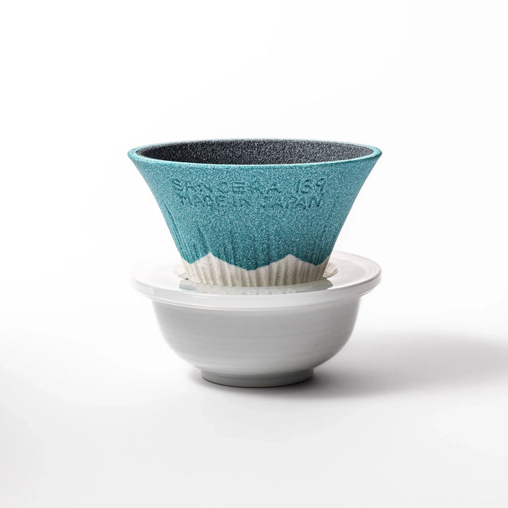 Turquoise Mount Fuji ceramic coffee filter with snowy peak handcrafted in Japan for unique pour over brewing.