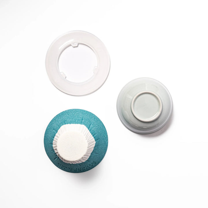 Turquoise Mount Fuji ceramic coffee filter with snowy peak handcrafted in Japan for unique pour over brewing.