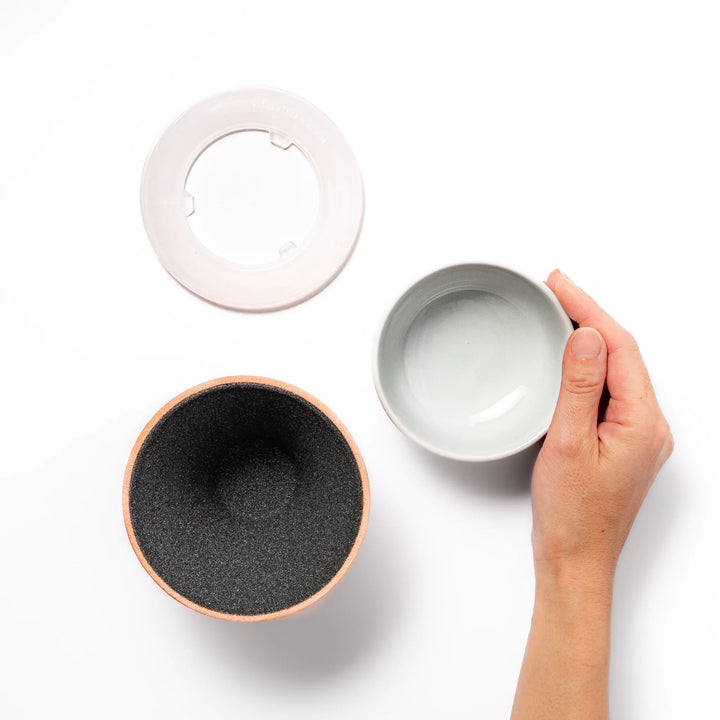 Orange Mount Fuji ceramic coffee filter with snowy peak handcrafted in Japan for modern pour over brewing.