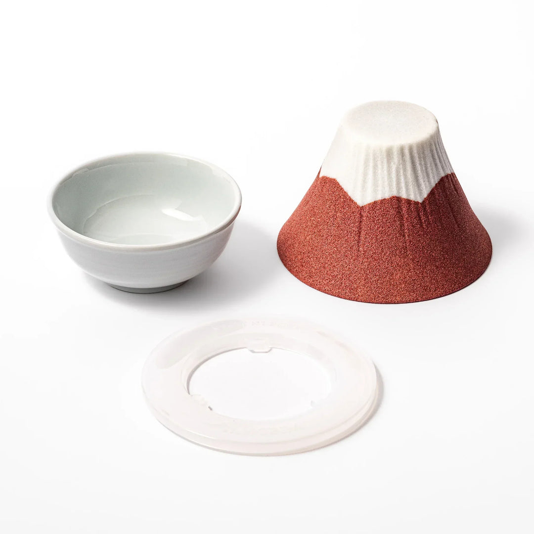 Red and white Mount Fuji ceramic coffee filter handcrafted in Japan for sustainable brewing and decor.