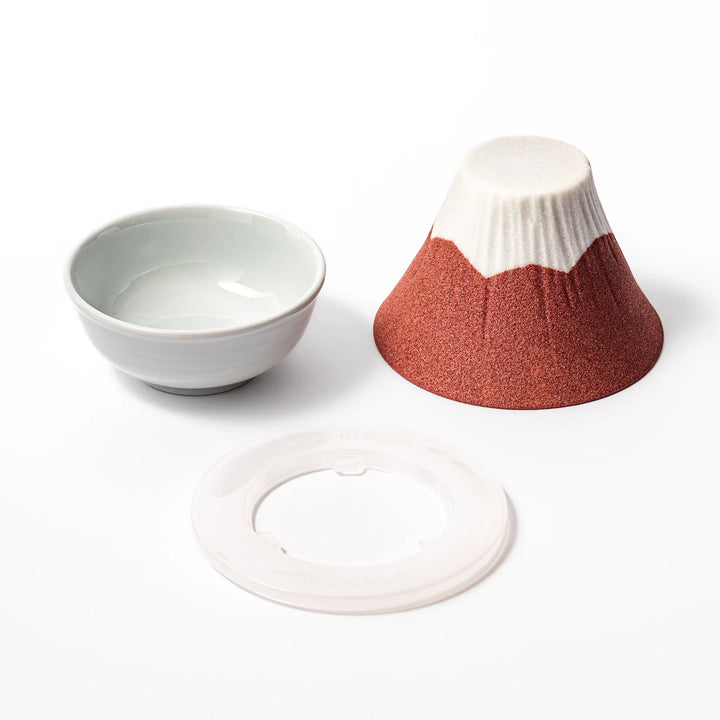 Red and white Mount Fuji ceramic coffee filter handcrafted in Japan for sustainable brewing and decor.