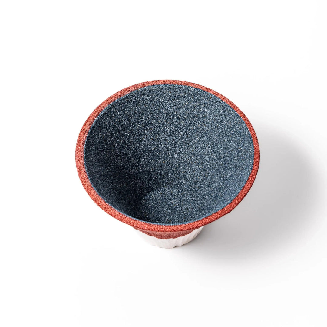 Red and white Mount Fuji ceramic coffee filter handcrafted in Japan for sustainable brewing and decor.