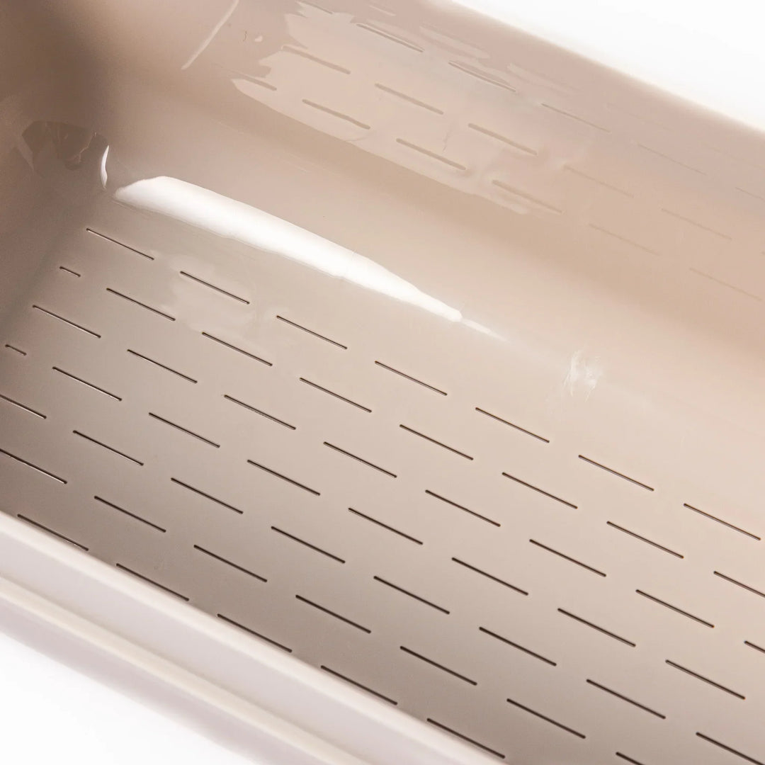 Japanese nukazuke fermentation box with clear lid and black rice paddle for home pickling and storage.