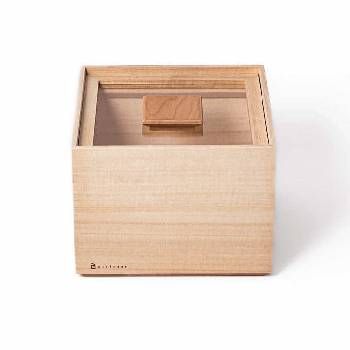 Paulownia wood rice container with airtight lid handcrafted in Japan to keep rice fresh and moisture free.