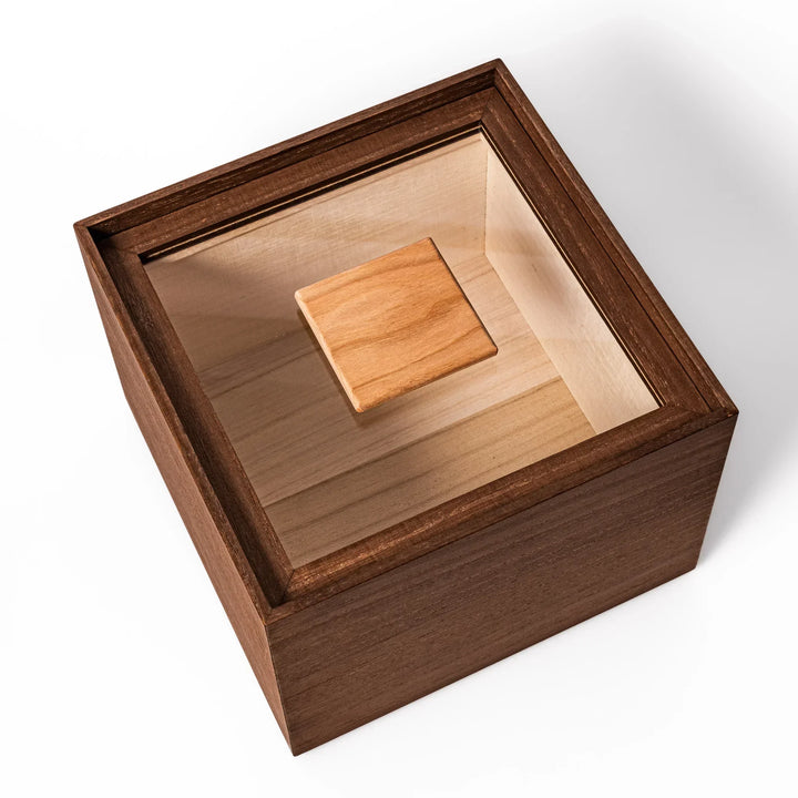 Dark brown paulownia wood rice container with airtight lid handcrafted in Japan for storing up to 3 kg rice.
