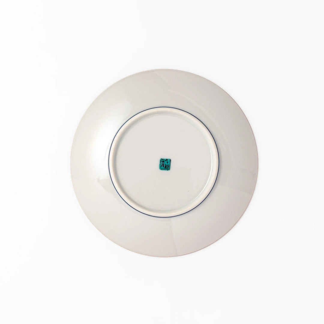 Japanese porcelain dessert plate with yellow patterned background gourd center blue pine and green leaves.