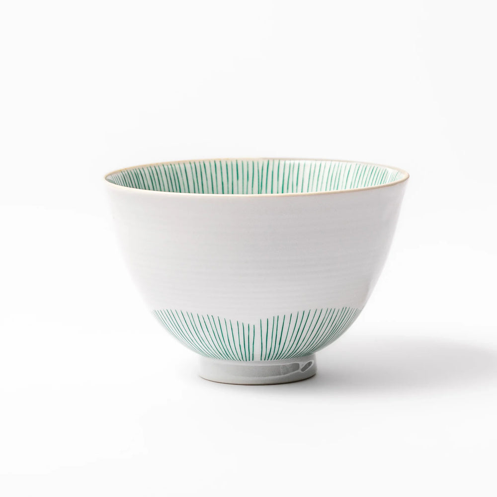 Japanese ceramic rice bowl with plum petal stripe design blending modern elegance with traditional style.