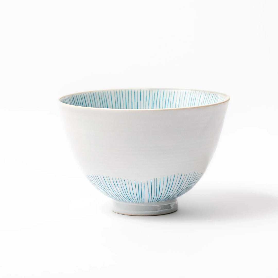 Japanese ceramic rice bowl with plum petal stripe design blending modern elegance with traditional style.