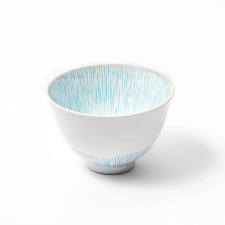 Japanese ceramic rice bowl with plum petal stripe design blending modern elegance with traditional style.