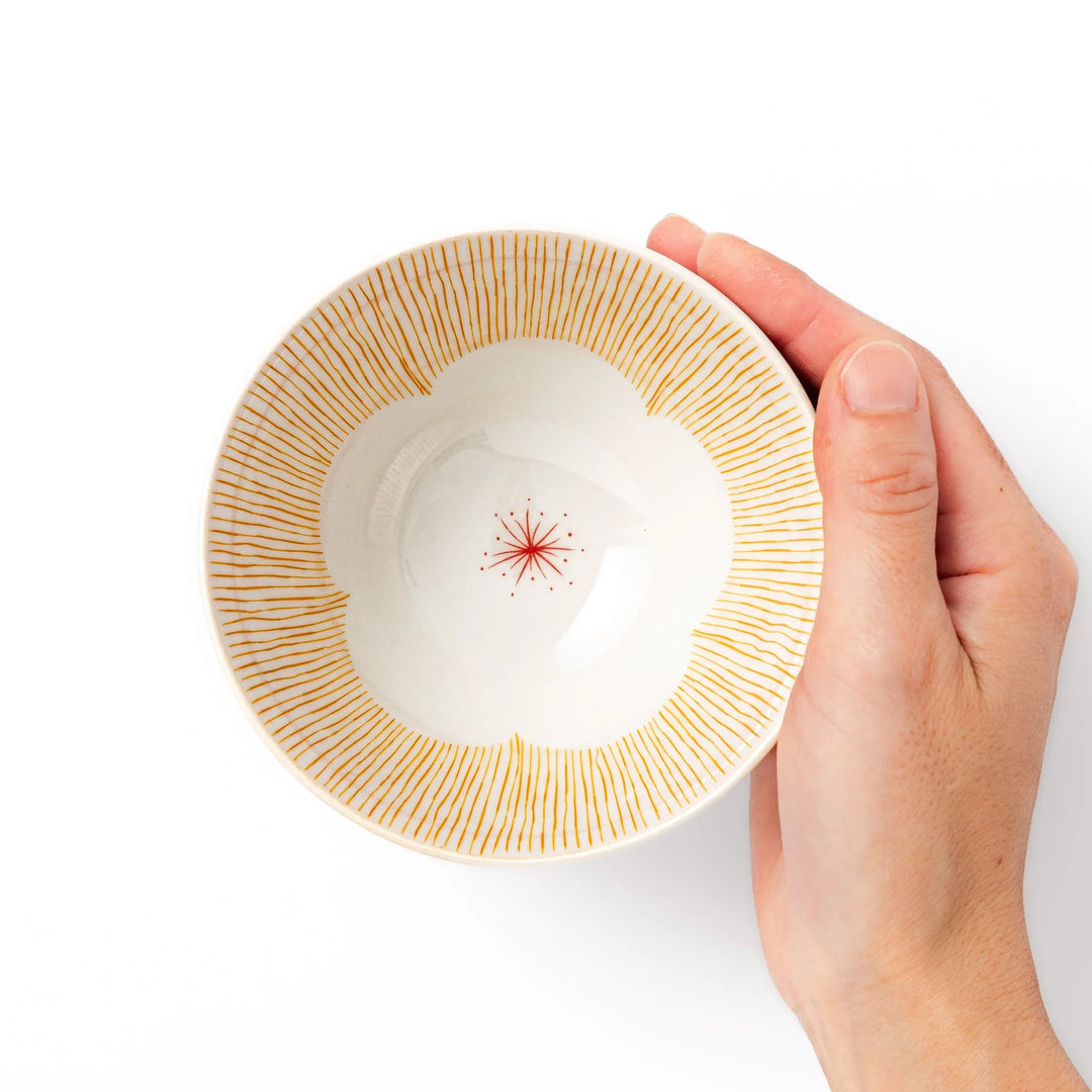 Japanese ceramic rice bowl with plum petal stripe design in orange, ideal for daily meals with a modern yet traditional touch