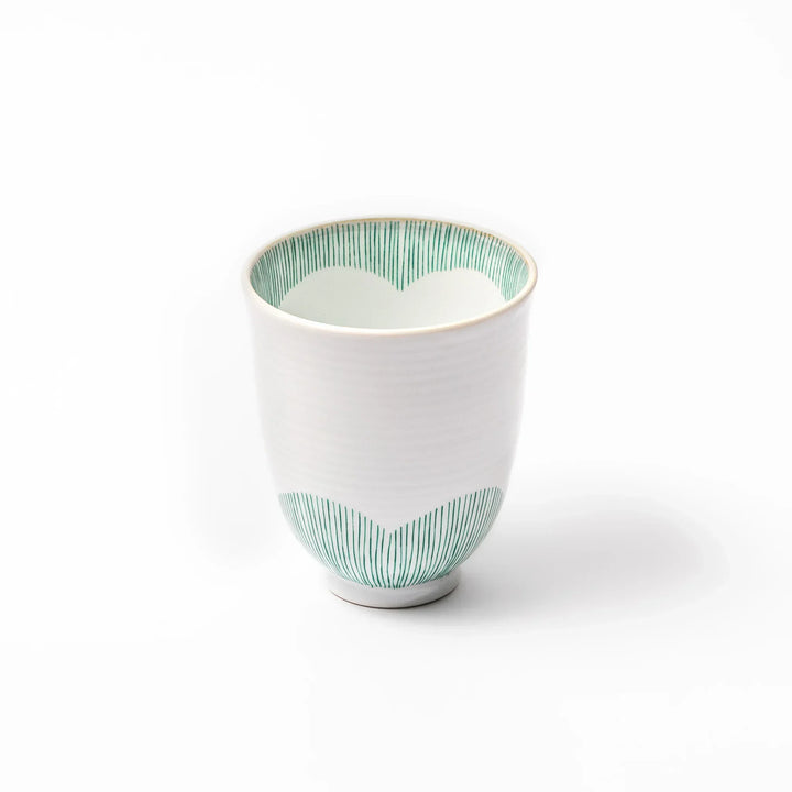 Japanese ceramic tea cup with plum petal stripe design blending modern simplicity with traditional elegance.