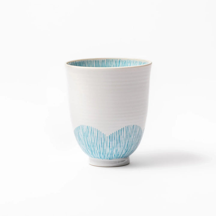 Japanese ceramic tea cup with plum petal stripe design in blue, showcasing minimalist elegance and traditional Japanese craft