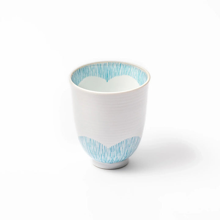 Japanese ceramic tea cup with plum petal stripe design in blue, showcasing minimalist elegance and traditional Japanese craft