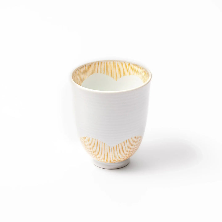 Japanese ceramic tea cup with plum petal stripe design in orange, combining modern minimalism and traditional Japanese style