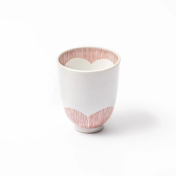 Japanese ceramic tea cup with plum petal stripe design in red, combining traditional elegance and modern simplicity