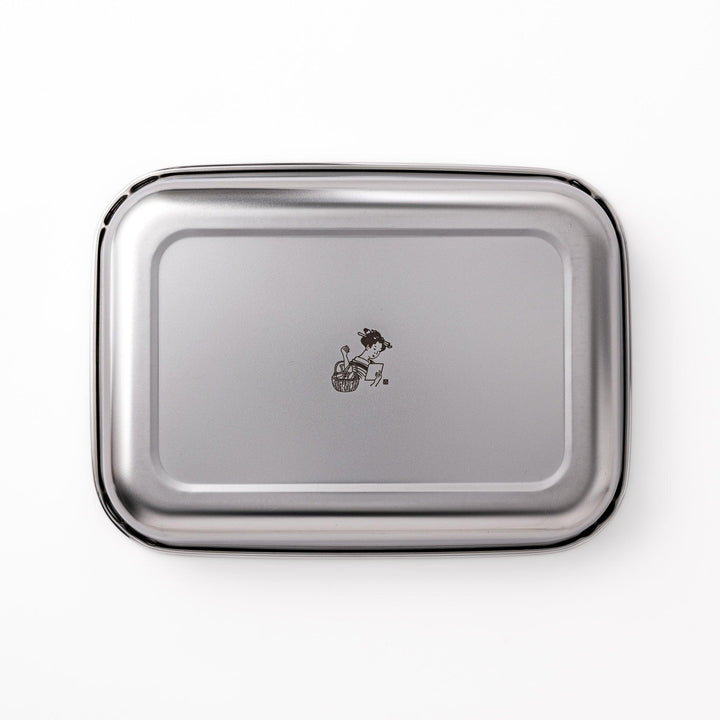 Stainless steel prep tray with engraved woman illustration blending Japanese design and kitchen function.