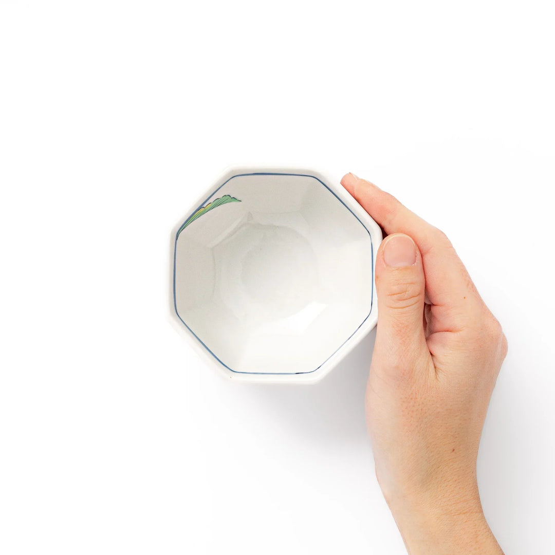 Japanese porcelain dessert bowl with a hand painted red turnip motif on a white body