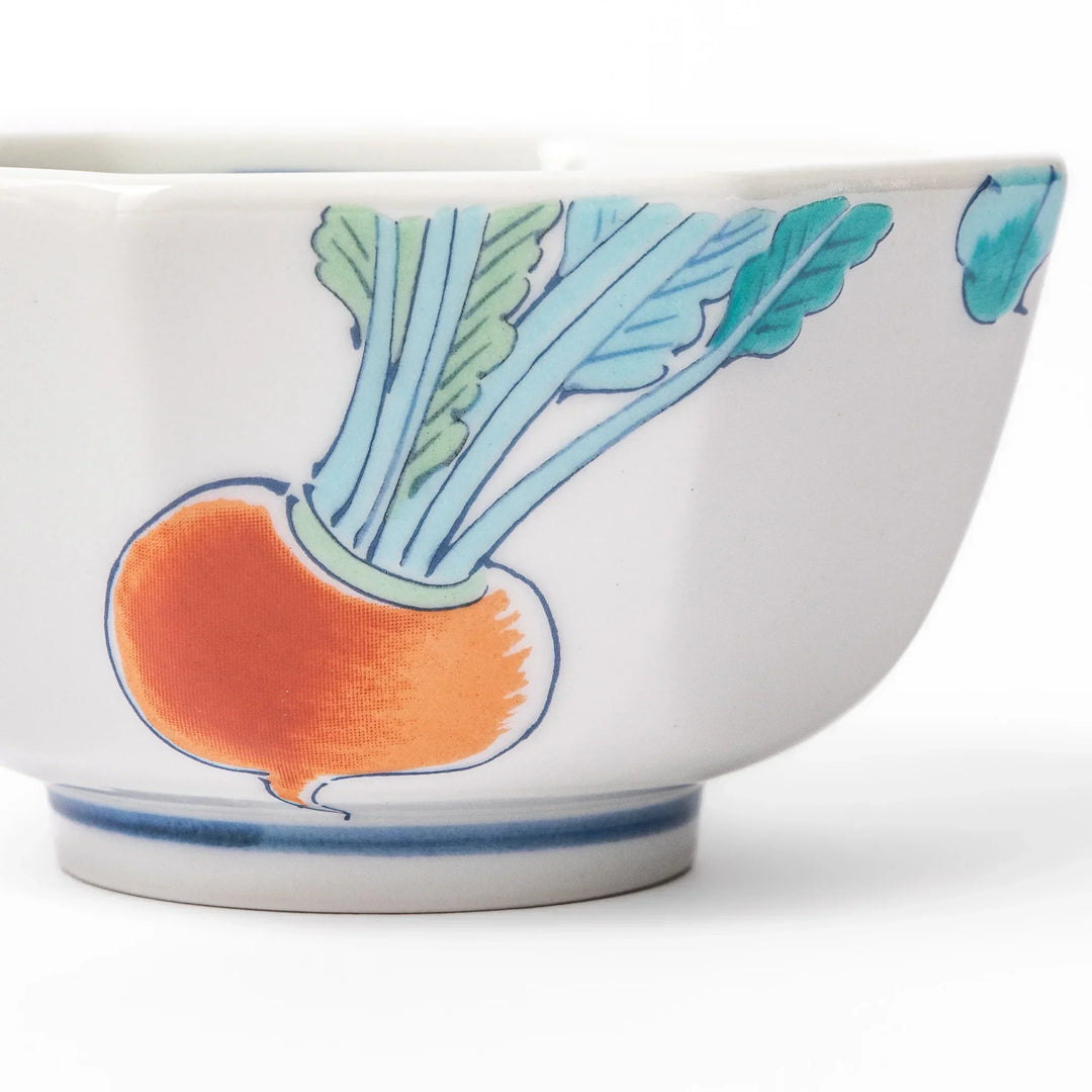 Japanese porcelain dessert bowl with a hand painted red turnip motif on a white body