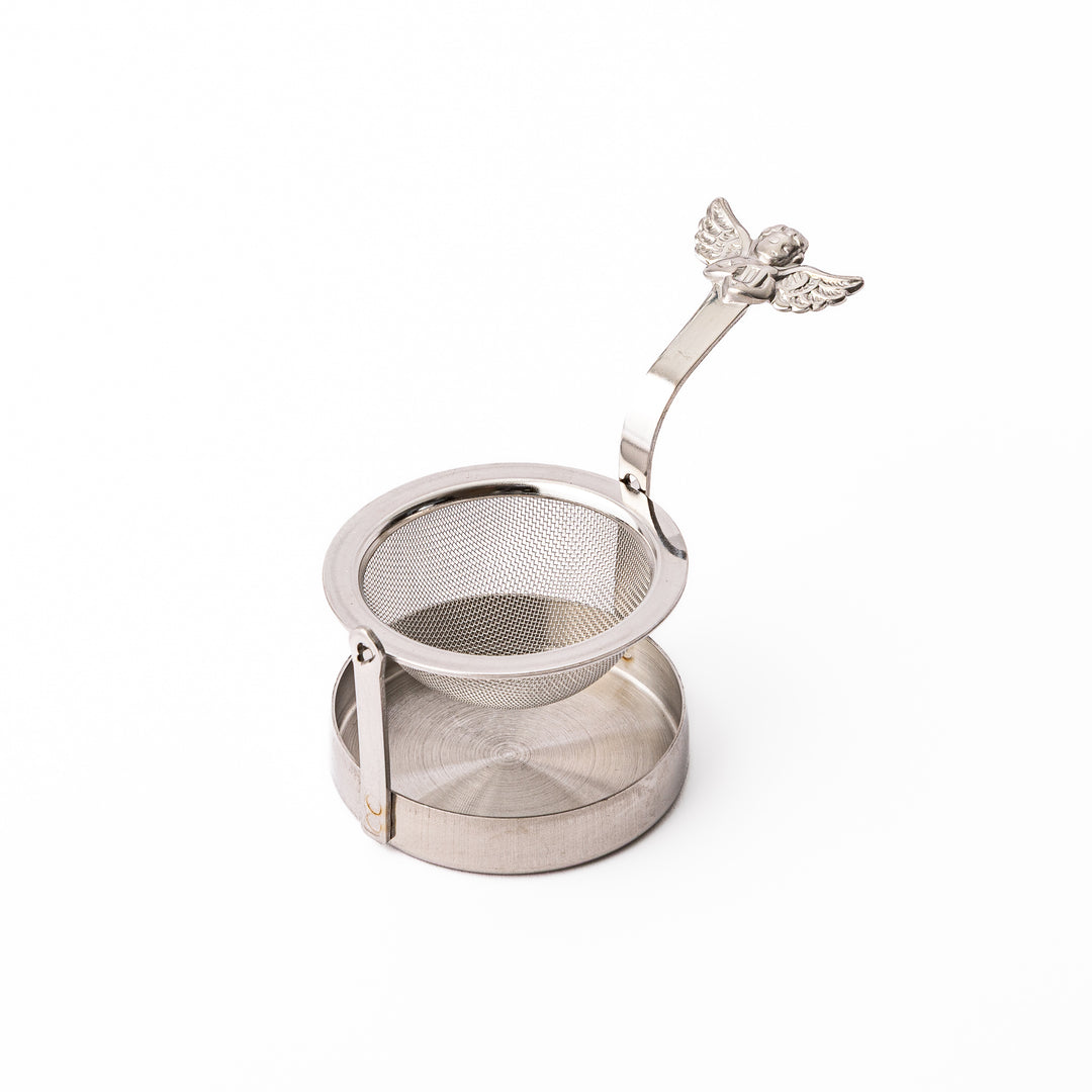 Elegant Japanese rotating angel tea strainer with stainless steel mesh basket and drip catcher base