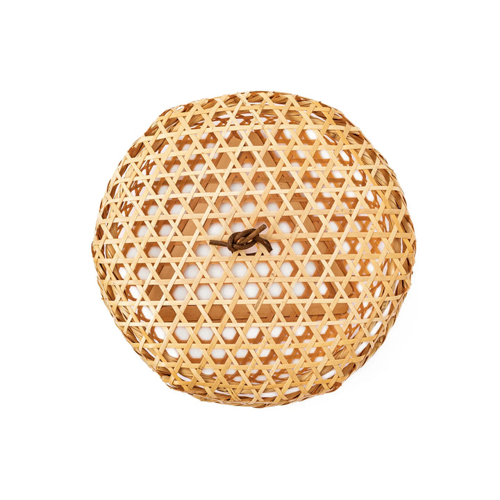 A medium round handwoven bamboo serving basket with a hexagonal mesh pattern lid resting on the woven border
